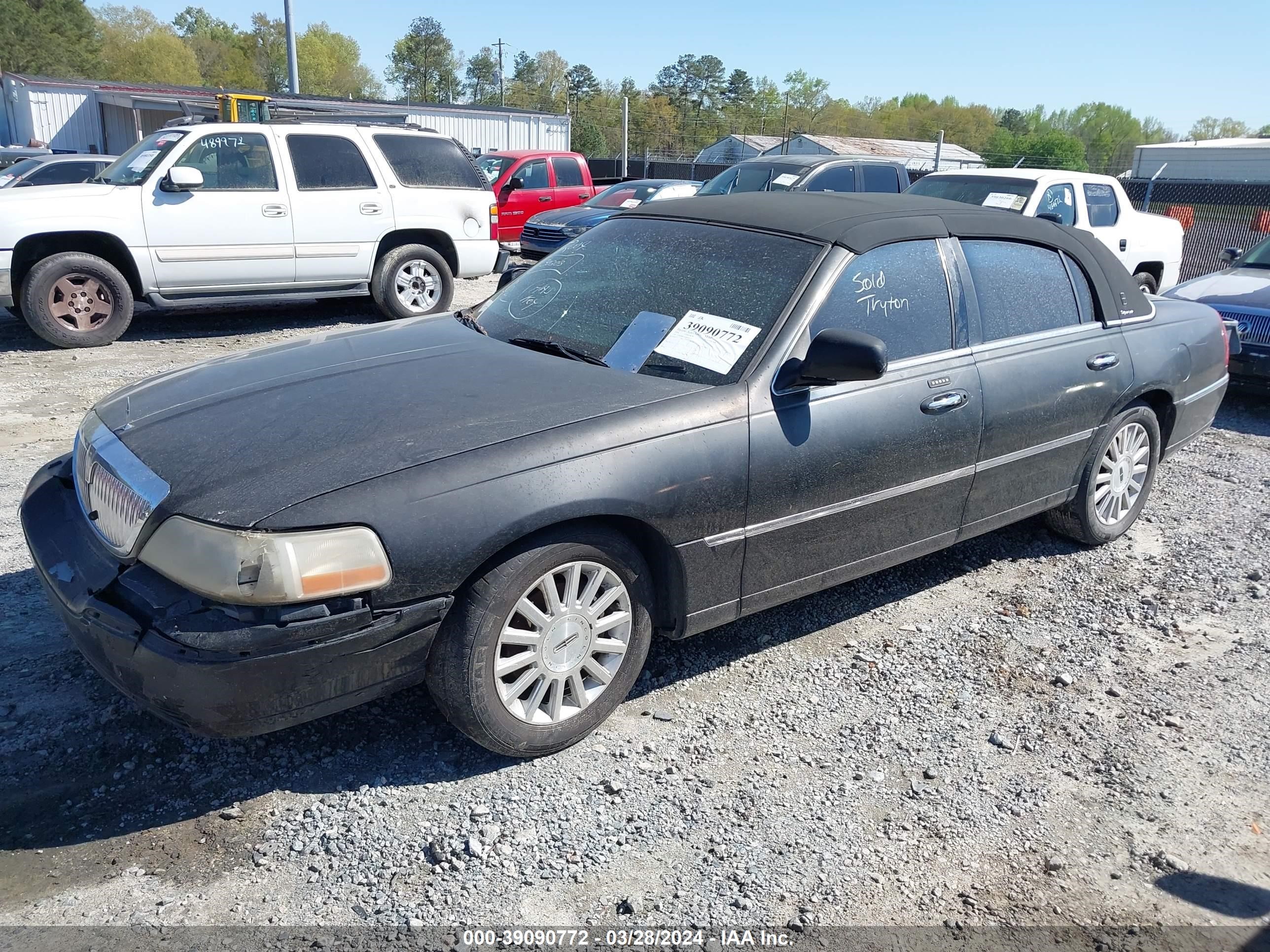 Photo 1 VIN: 1LNHM81W14Y609299 - LINCOLN TOWN CAR 