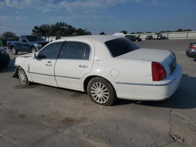 Photo 1 VIN: 1LNHM81W14Y643890 - LINCOLN TOWN CAR E 