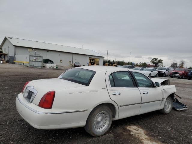 Photo 2 VIN: 1LNHM81W2XY671461 - LINCOLN TOWN CAR E 