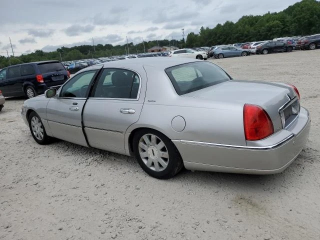 Photo 1 VIN: 1LNHM81W34Y604301 - LINCOLN TOWN CAR E 