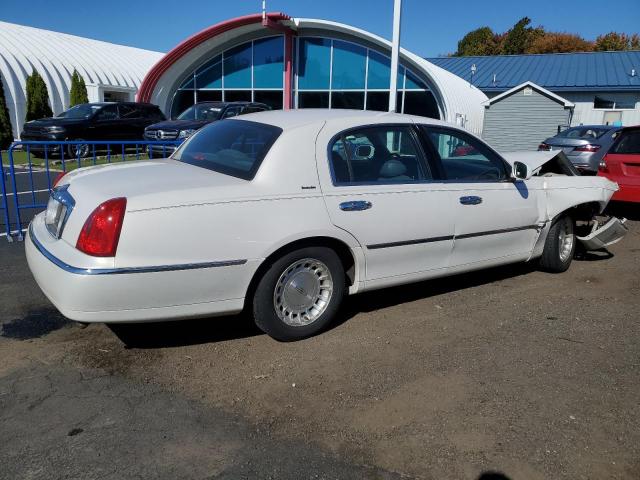 Photo 2 VIN: 1LNHM81W4XY628028 - LINCOLN TOWN CAR E 