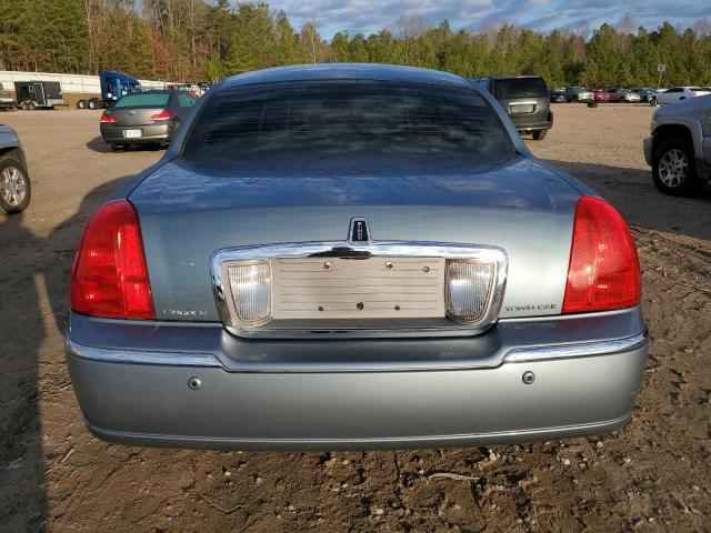 Photo 5 VIN: 1LNHM81W54Y644928 - LINCOLN TOWN CAR E 