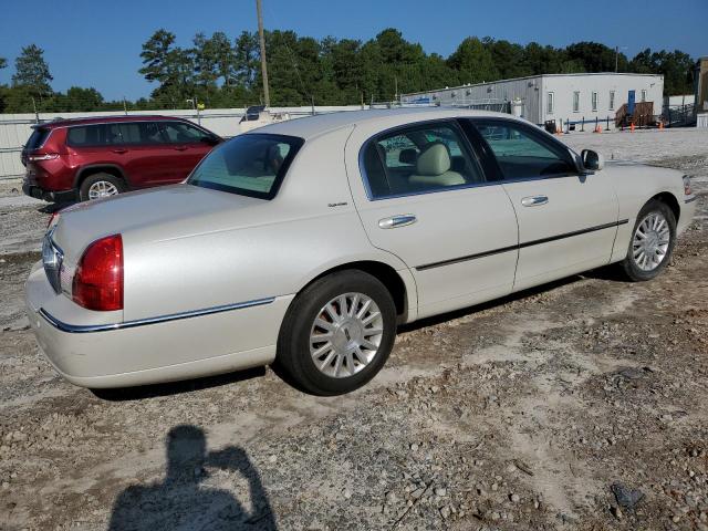 Photo 2 VIN: 1LNHM81W64Y677890 - LINCOLN TOWN CAR E 