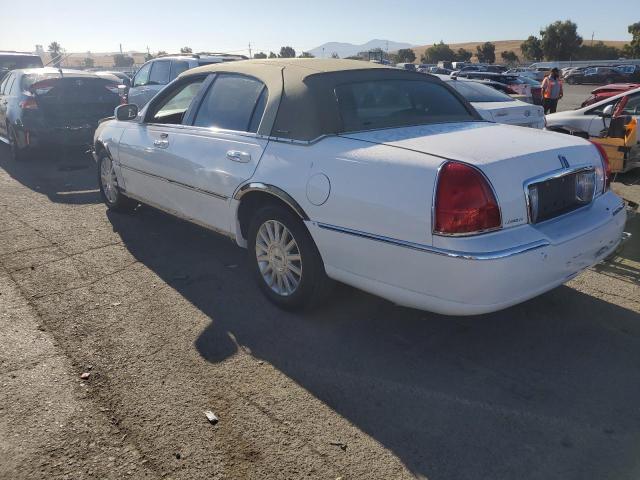 Photo 1 VIN: 1LNHM81W74Y669443 - LINCOLN TOWN CAR E 