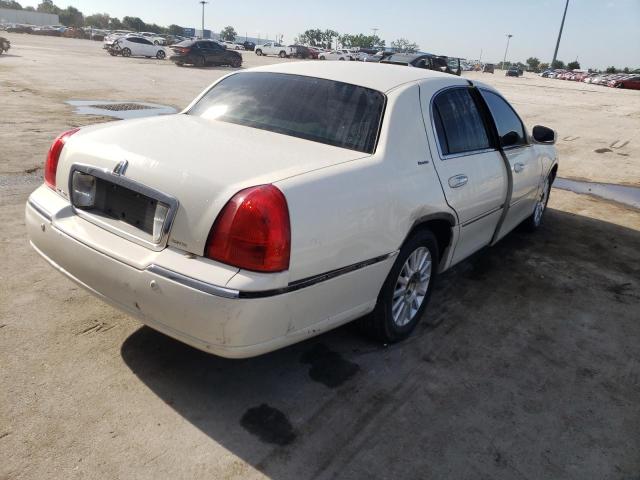 Photo 3 VIN: 1LNHM81W83Y653945 - LINCOLN TOWN CAR E 