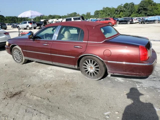 Photo 1 VIN: 1LNHM81W94Y633138 - LINCOLN TOWN CAR E 