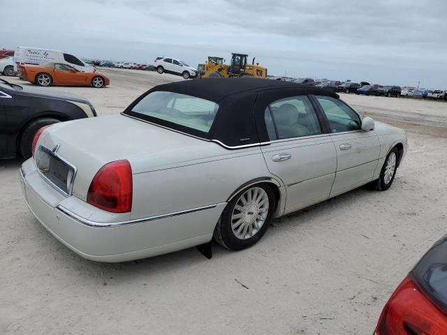 Photo 2 VIN: 1LNHM81W94Y677804 - LINCOLN TOWN CAR E 