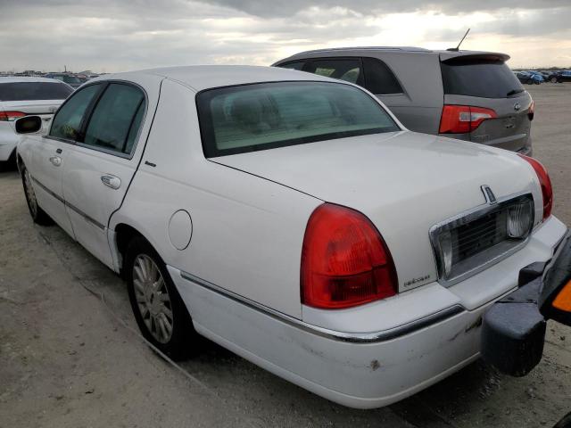 Photo 1 VIN: 1LNHM81WX3Y703969 - LINCOLN TOWN CAR E 