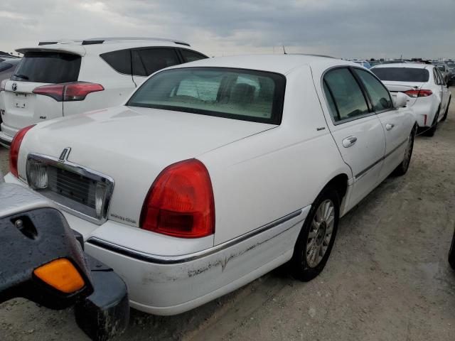 Photo 2 VIN: 1LNHM81WX3Y703969 - LINCOLN TOWN CAR E 