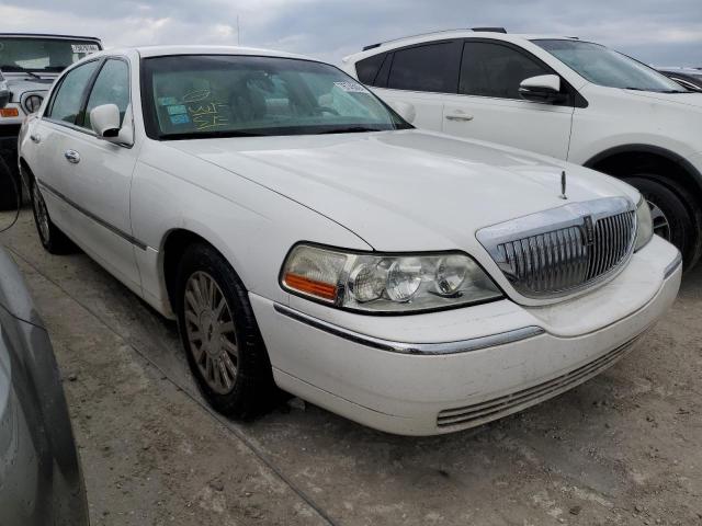 Photo 3 VIN: 1LNHM81WX3Y703969 - LINCOLN TOWN CAR E 