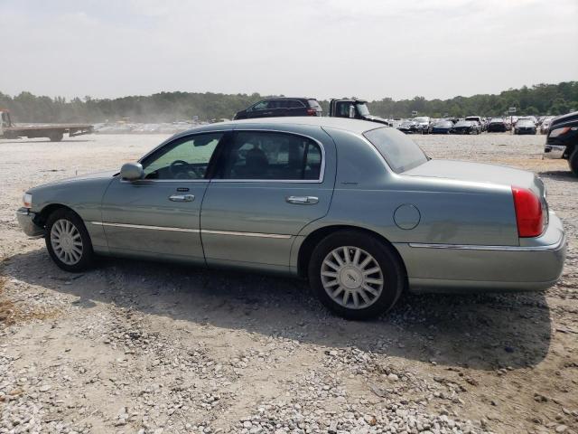 Photo 1 VIN: 1LNHM81WX4Y606823 - LINCOLN TOWN CAR E 