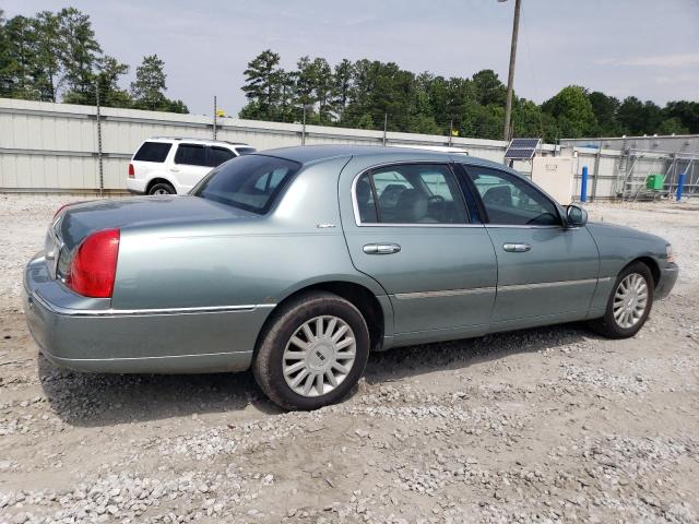 Photo 2 VIN: 1LNHM81WX4Y606823 - LINCOLN TOWN CAR E 