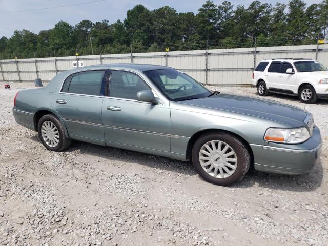 Photo 3 VIN: 1LNHM81WX4Y606823 - LINCOLN TOWN CAR E 