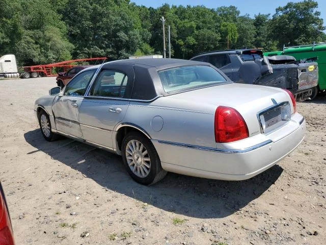 Photo 1 VIN: 1LNHM81WX4Y672238 - LINCOLN TOWN CAR E 