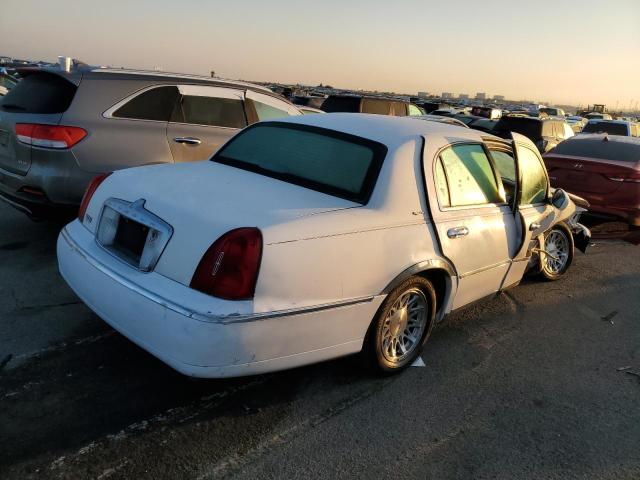 Photo 2 VIN: 1LNHM82WXXY683307 - LINCOLN TOWNCAR 