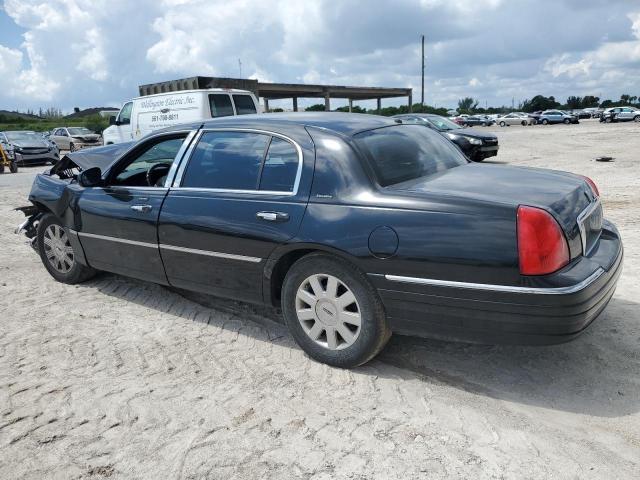 Photo 1 VIN: 1LNHM84W94Y668855 - LINCOLN TOWN CAR E 