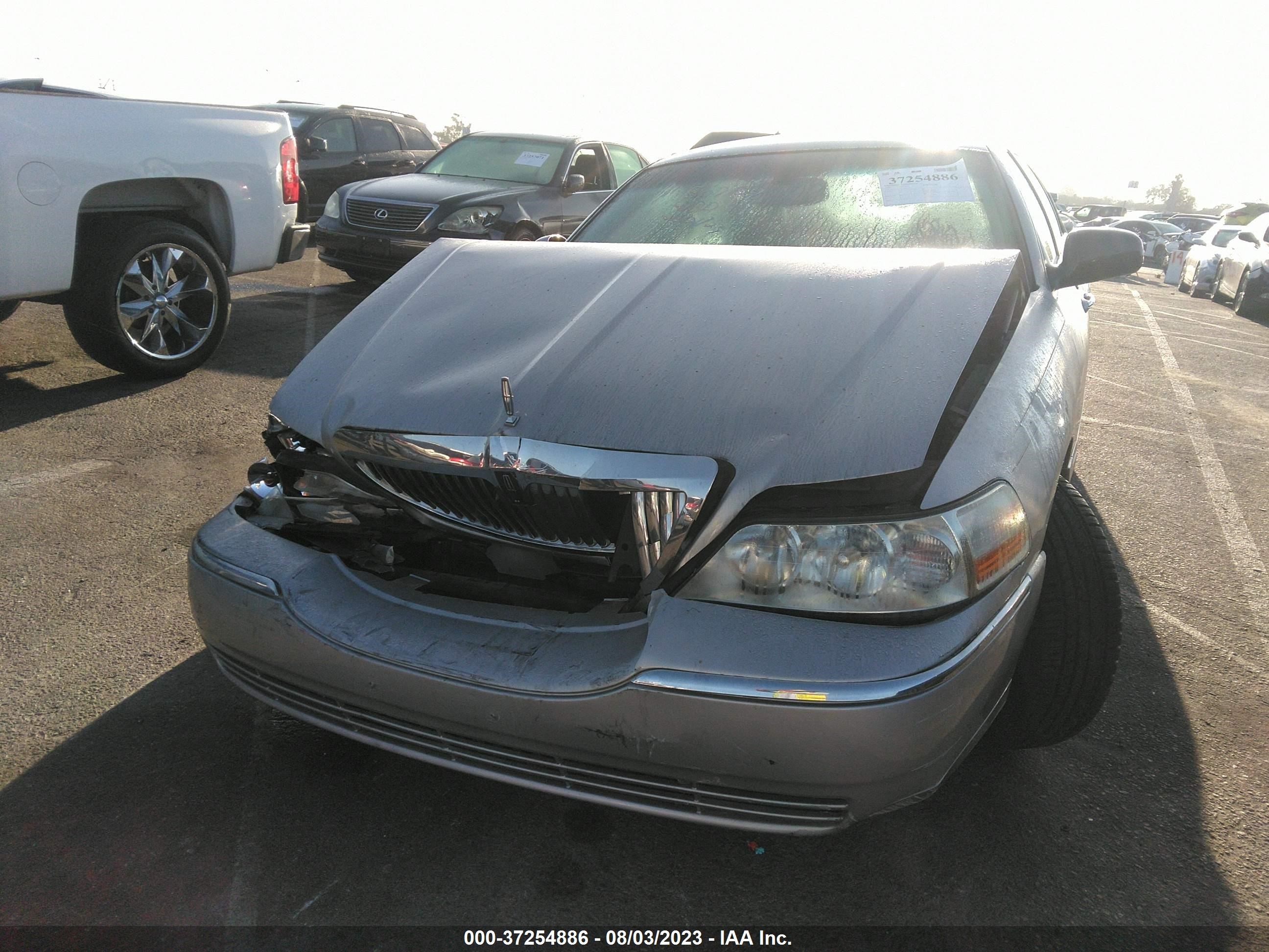 Photo 10 VIN: 1LNHM85W64Y625203 - LINCOLN TOWN CAR 