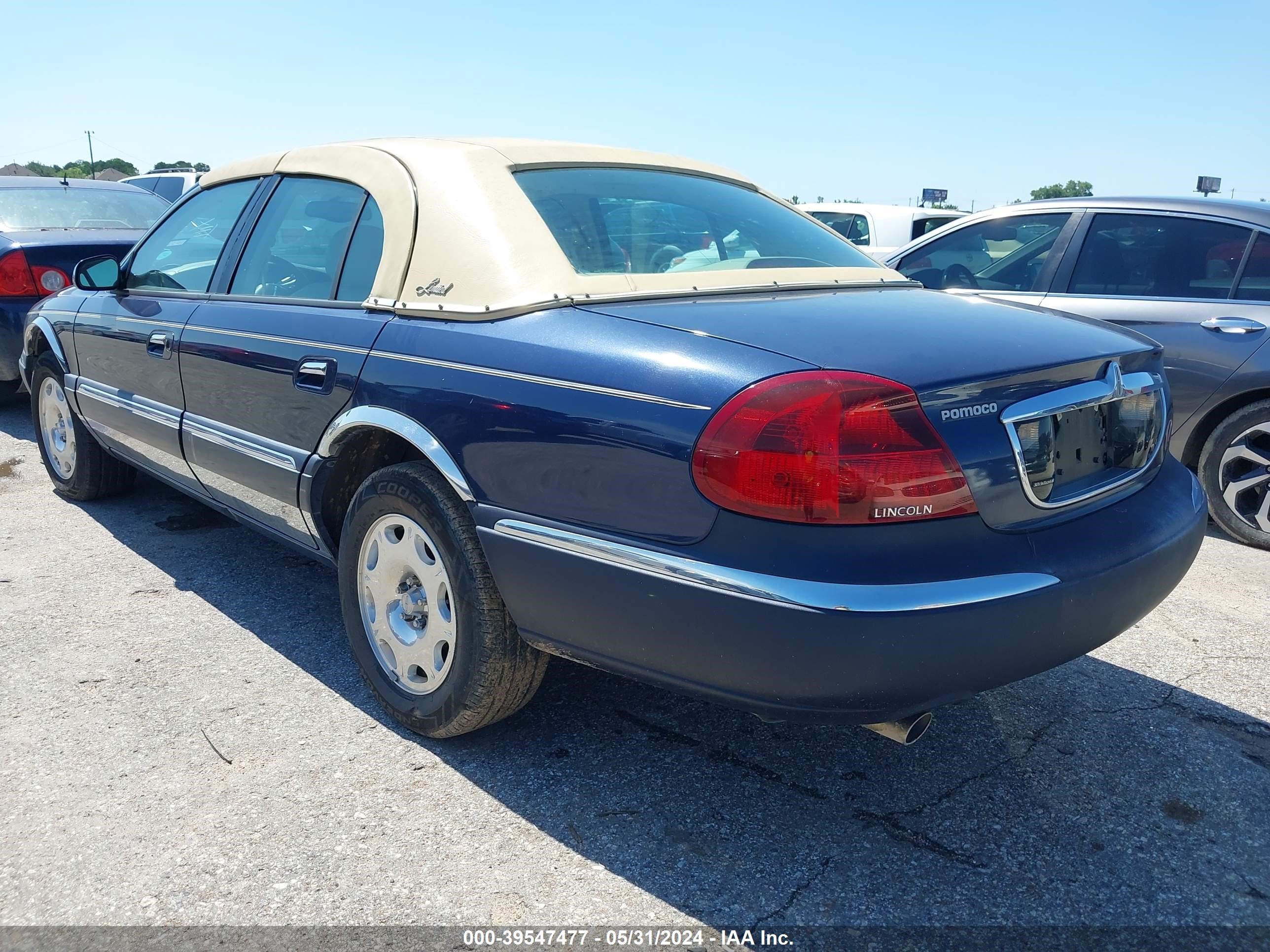 Photo 2 VIN: 1LNHM97V02Y647916 - LINCOLN CONTINENTAL 