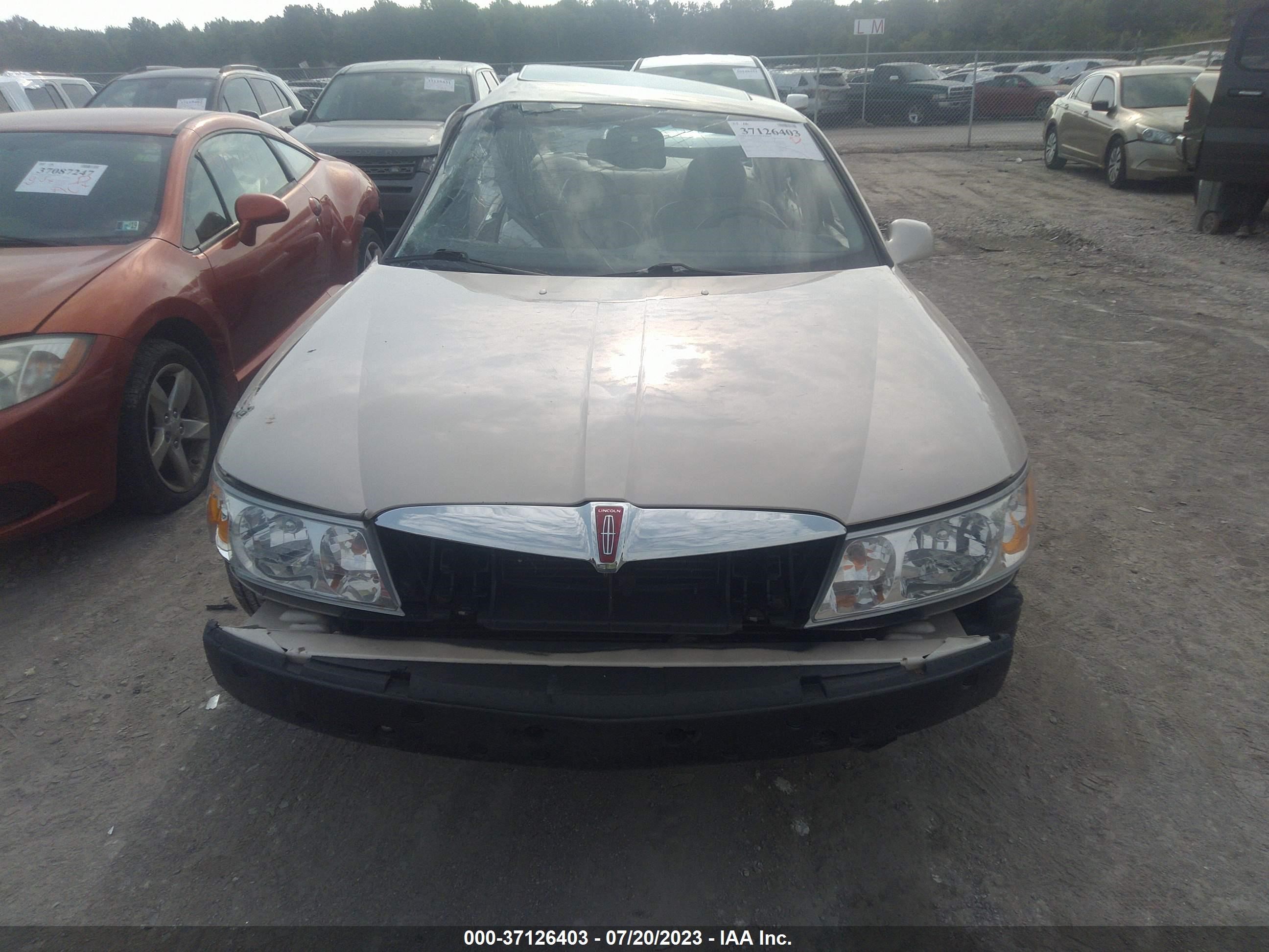 Photo 11 VIN: 1LNHM97V71Y730158 - LINCOLN CONTINENTAL 