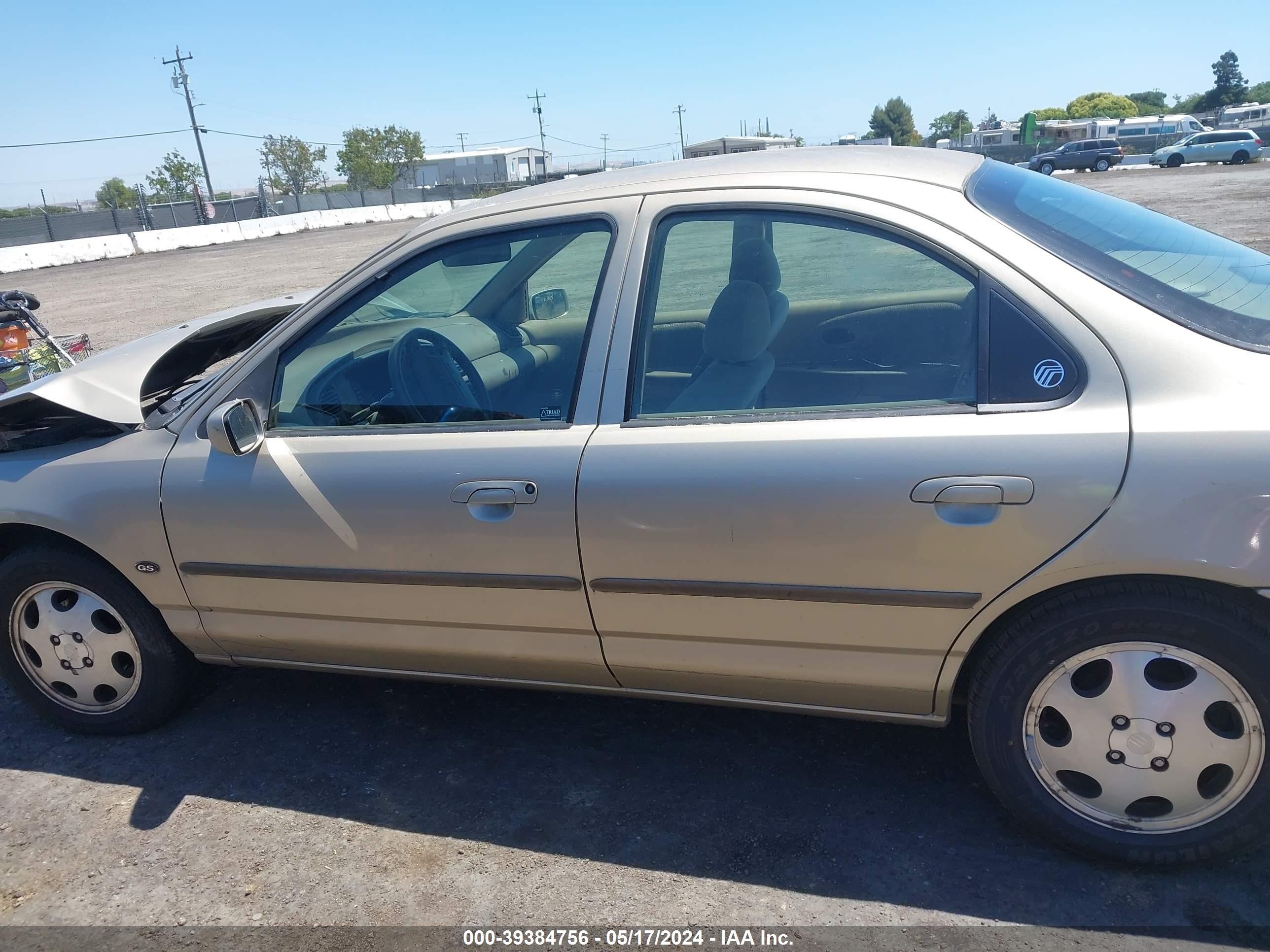 Photo 12 VIN: 1MEFM6534YK610017 - MERCURY MYSTIQUE 