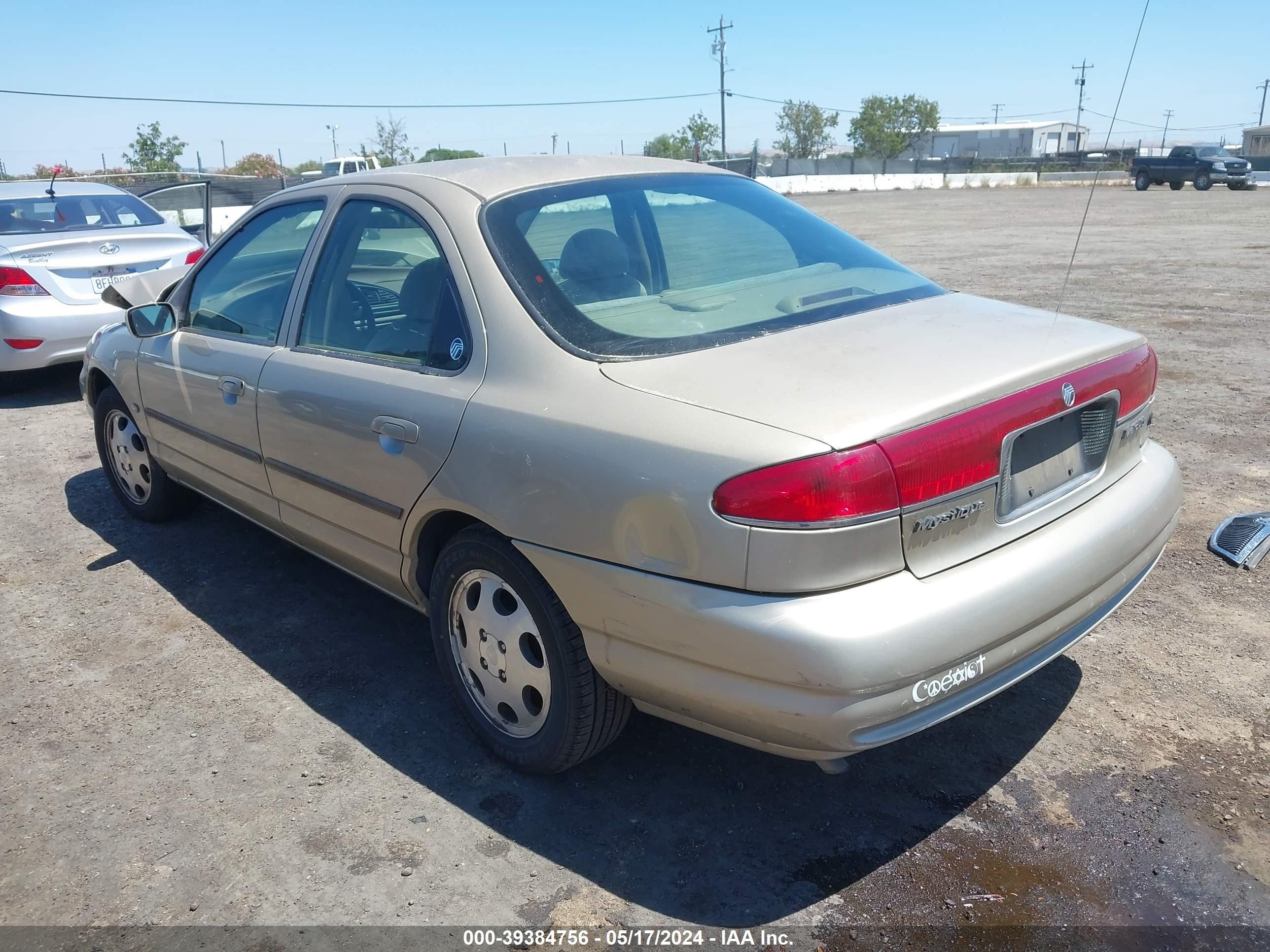 Photo 2 VIN: 1MEFM6534YK610017 - MERCURY MYSTIQUE 