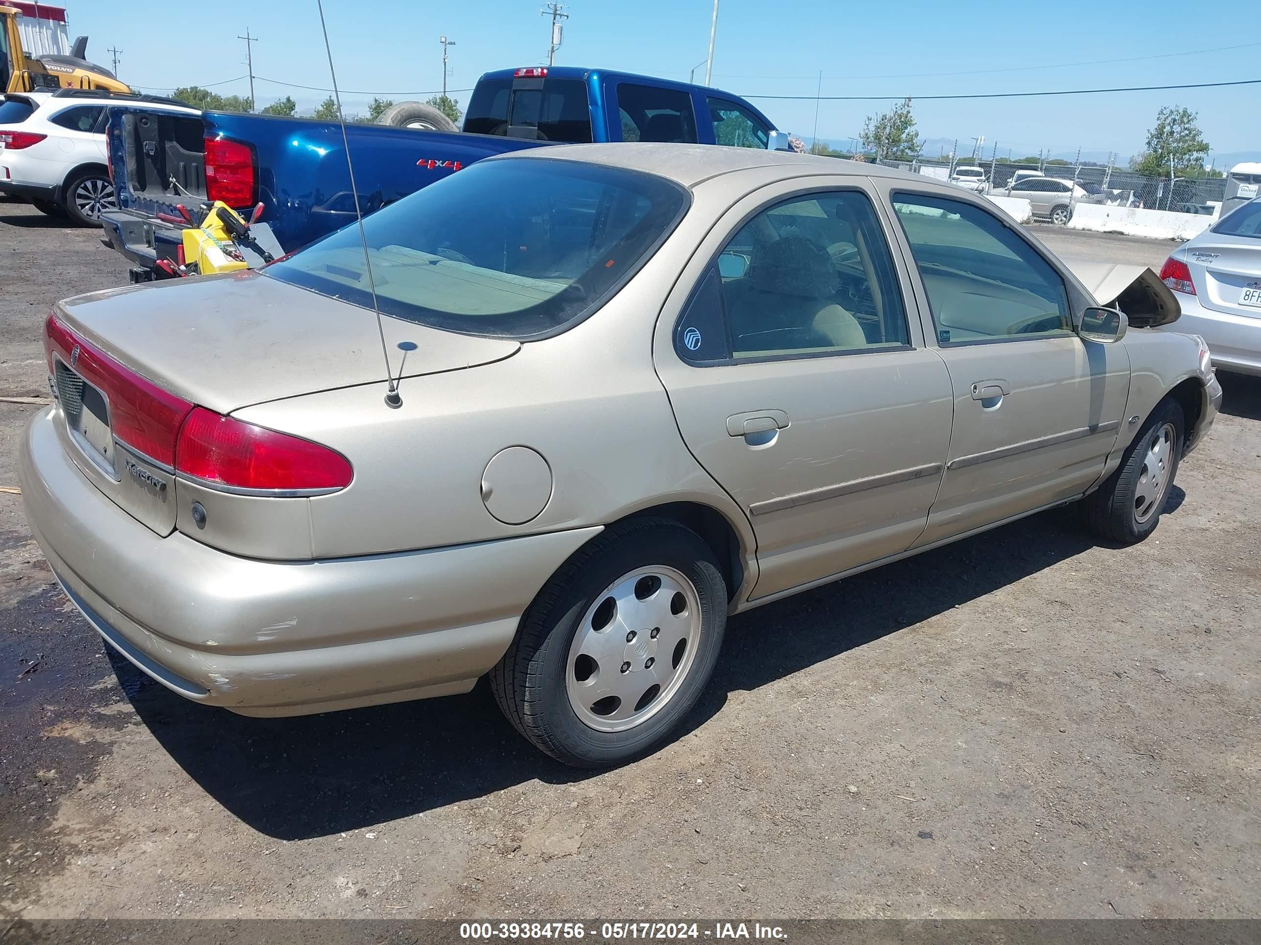 Photo 3 VIN: 1MEFM6534YK610017 - MERCURY MYSTIQUE 