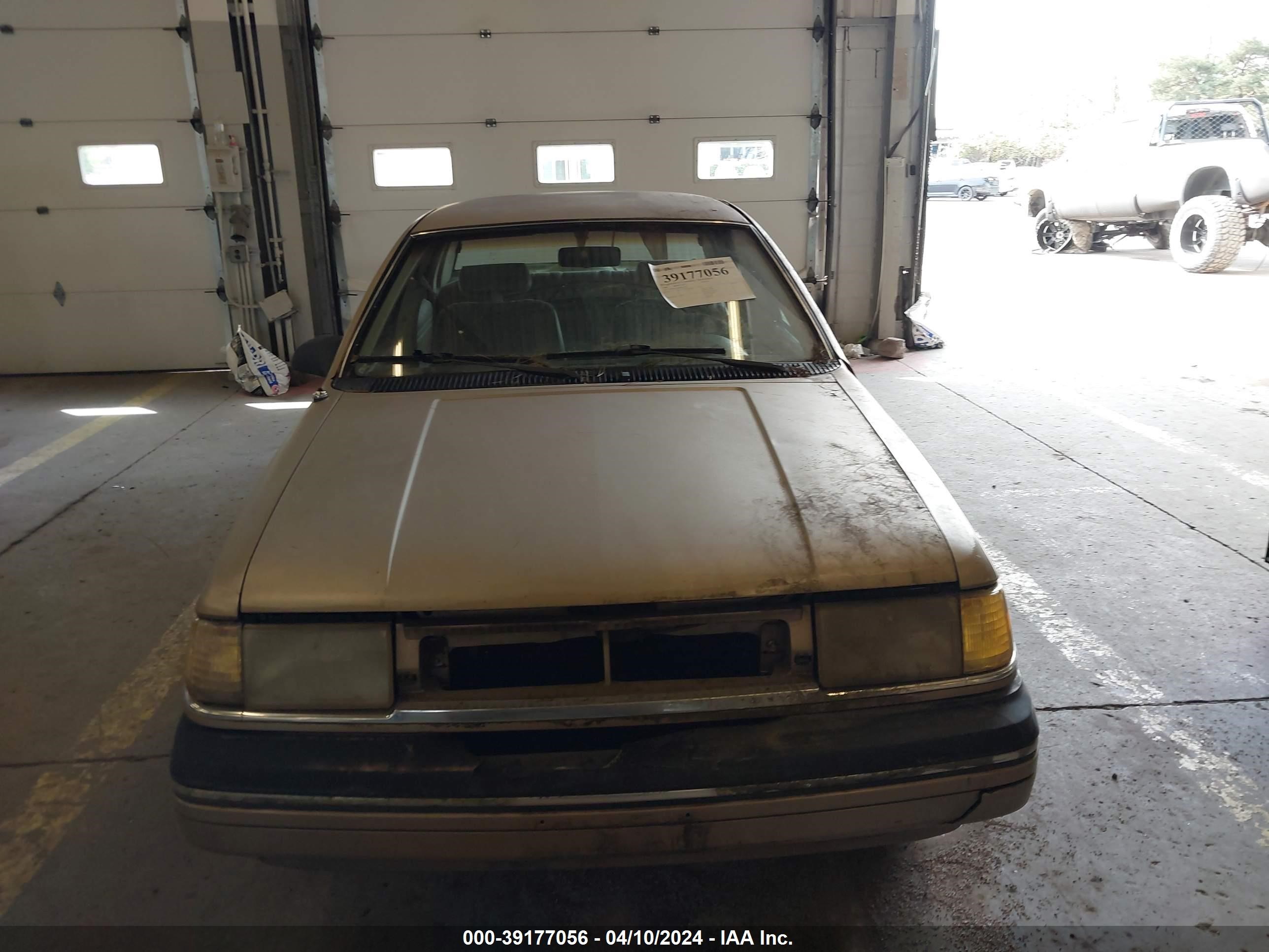 Photo 11 VIN: 1MEPM36S8KK612224 - MERCURY TOPAZ 