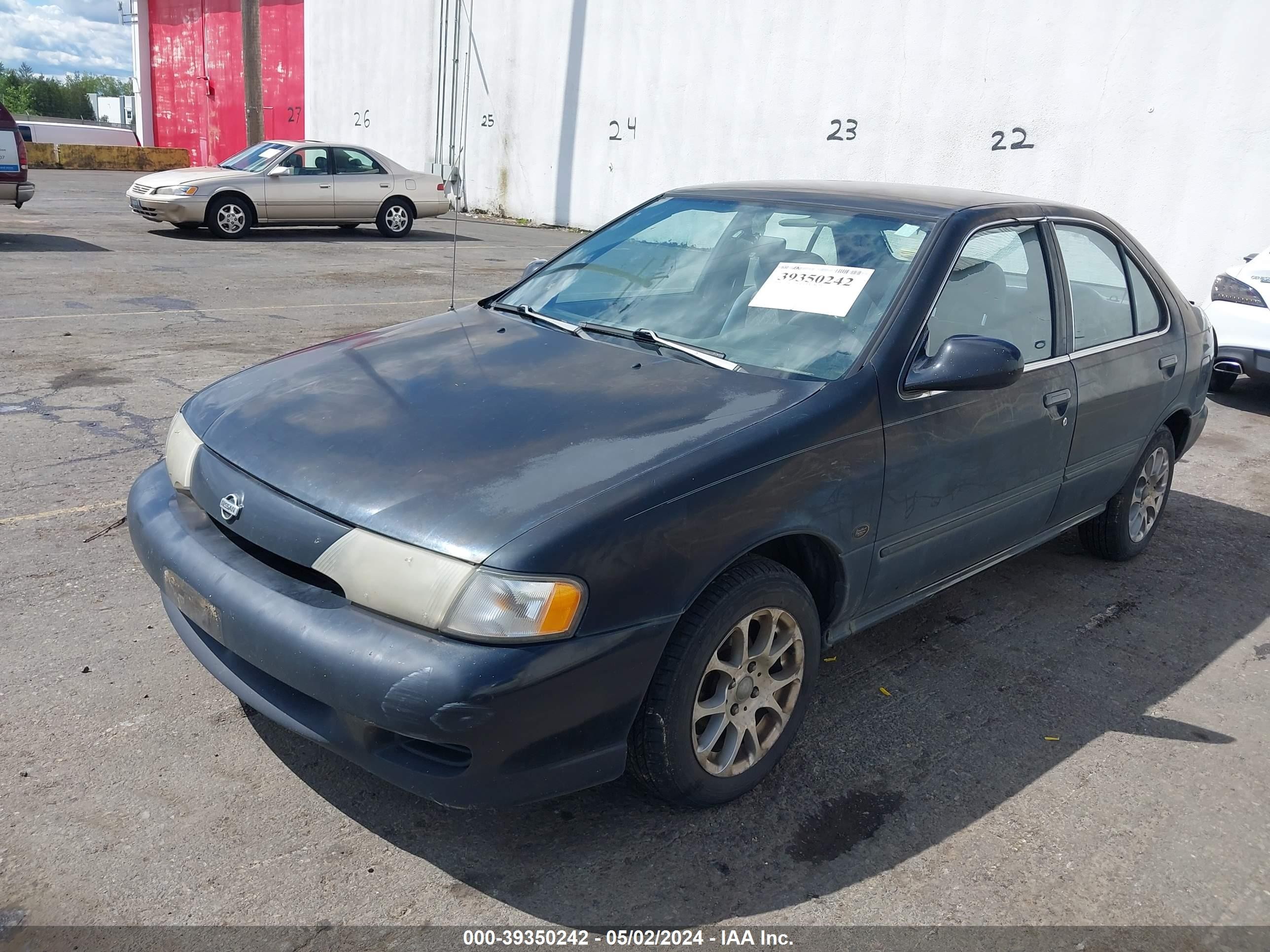 Photo 1 VIN: 1N4AB41D9XC704624 - NISSAN SENTRA 