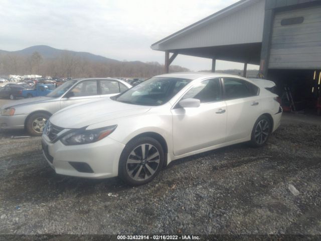 Photo 1 VIN: 1N4AL3AP3GC284702 - NISSAN ALTIMA 