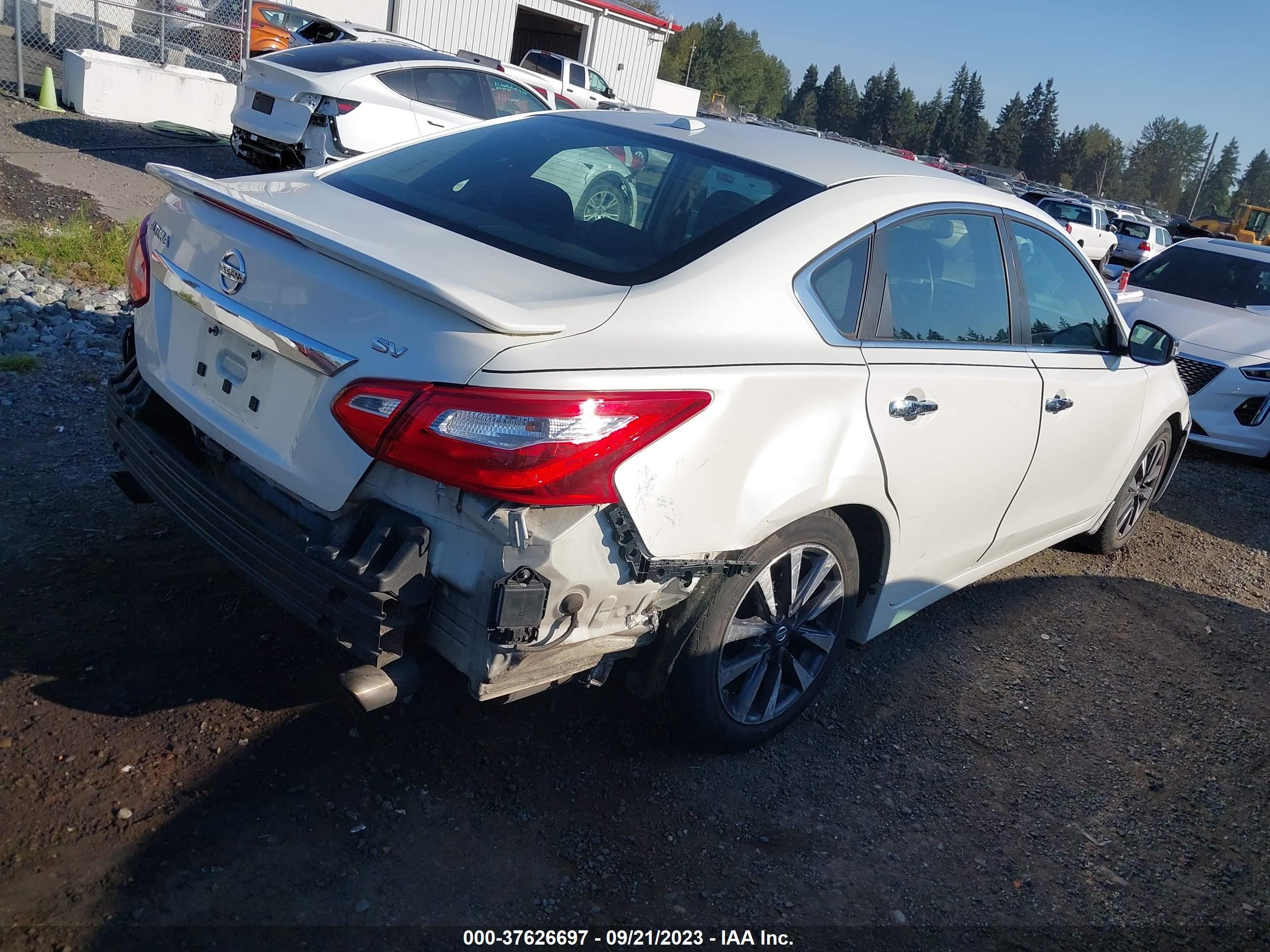 Photo 3 VIN: 1N4AL3AP4GC119063 - NISSAN ALTIMA 