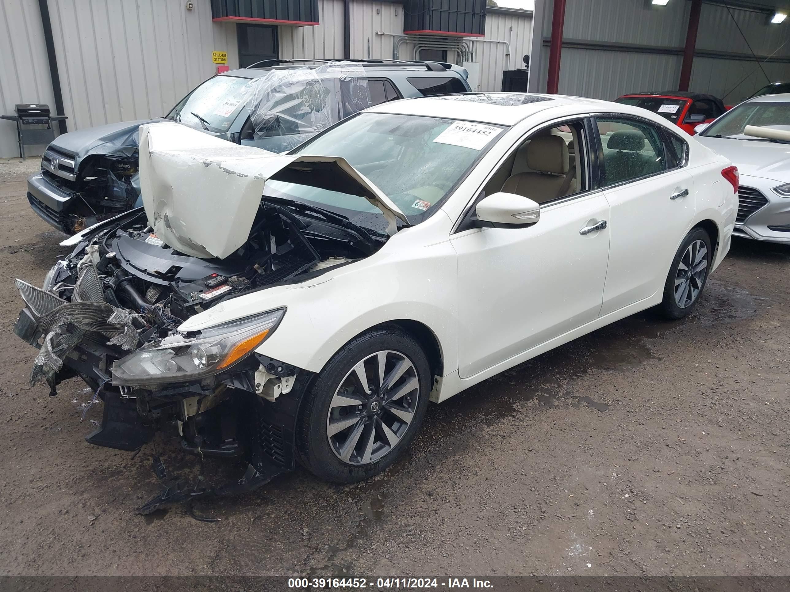 Photo 1 VIN: 1N4AL3AP9GC217232 - NISSAN ALTIMA 