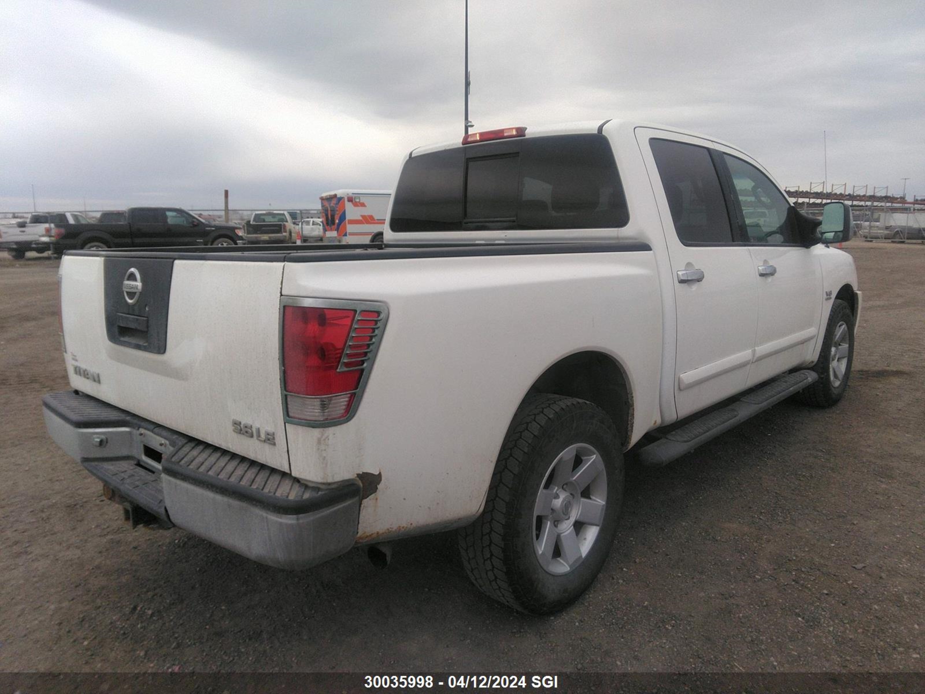 Photo 3 VIN: 1N6AA07B44N552292 - NISSAN TITAN 