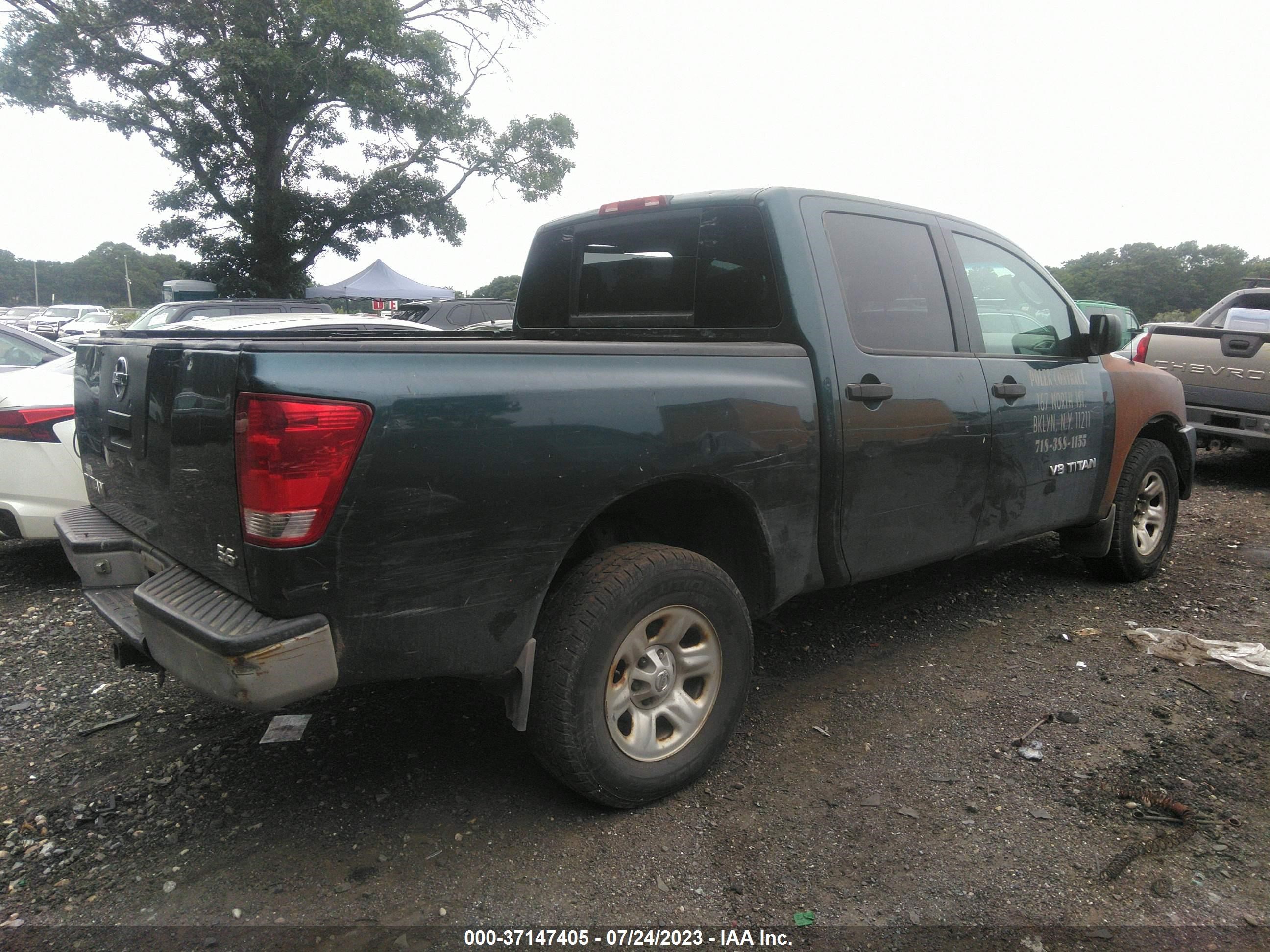 Photo 3 VIN: 1N6AA07BX6N504766 - NISSAN TITAN 