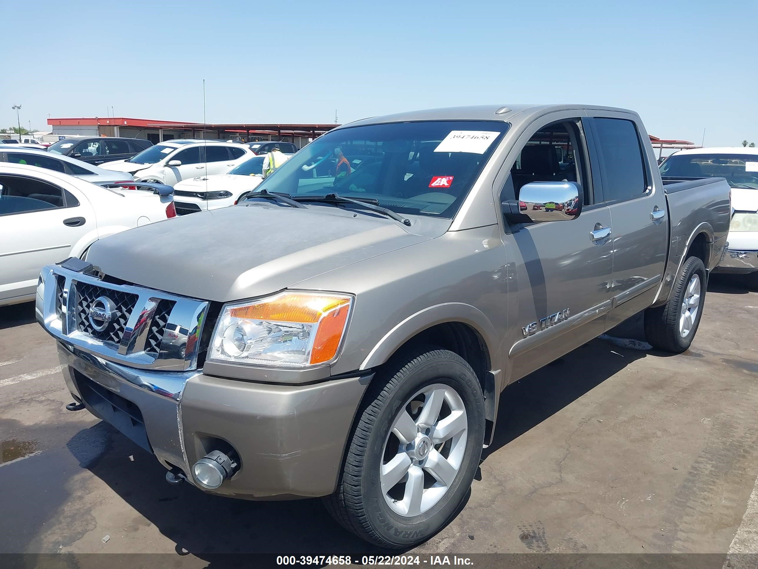 Photo 1 VIN: 1N6AA07CX9N310851 - NISSAN TITAN 