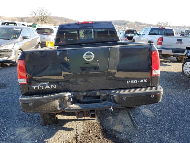 Photo 5 VIN: 1N6AA0CC3AN314010 - NISSAN TITAN 