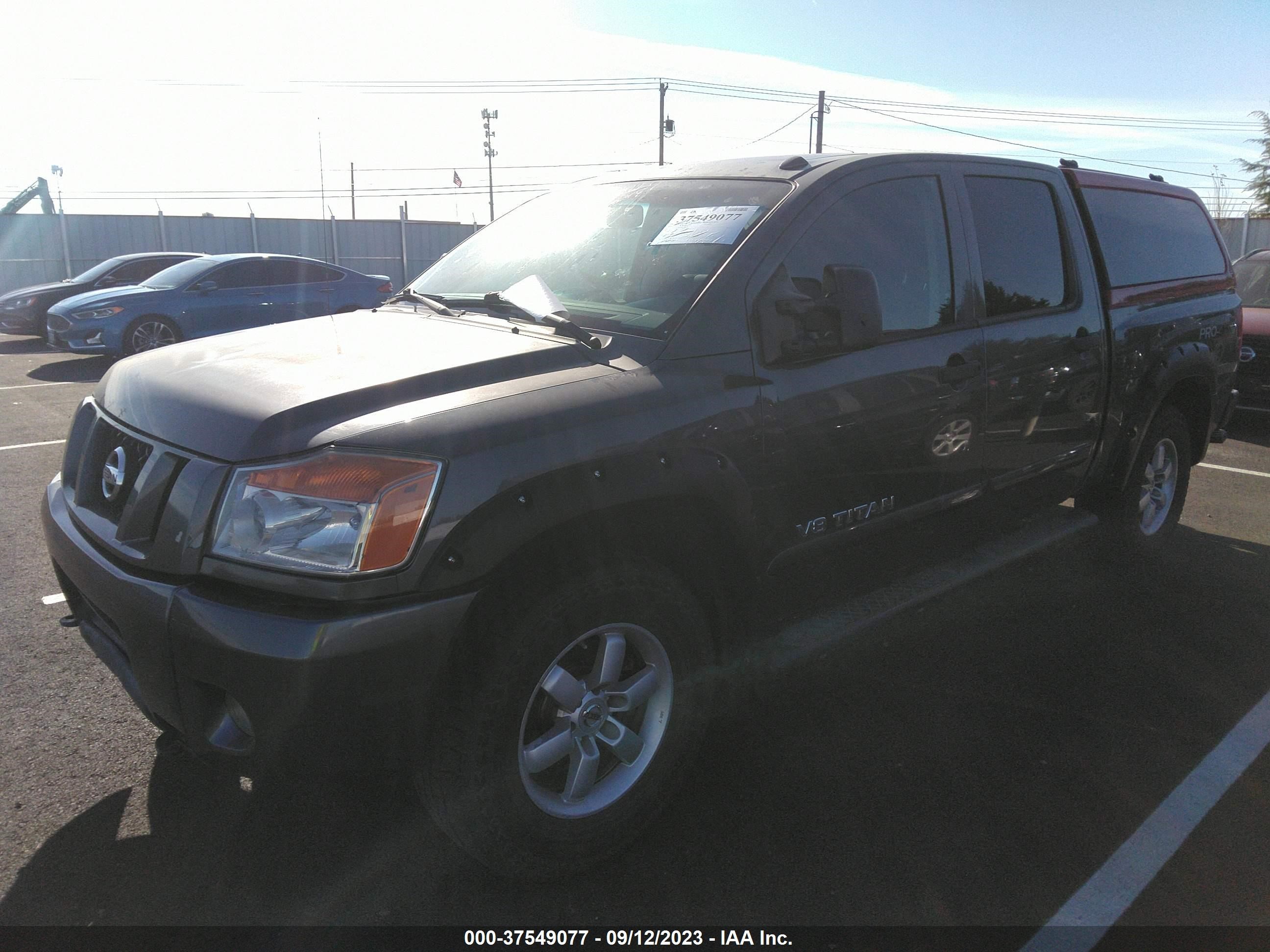 Photo 1 VIN: 1N6AA0EC8BN318276 - NISSAN TITAN 