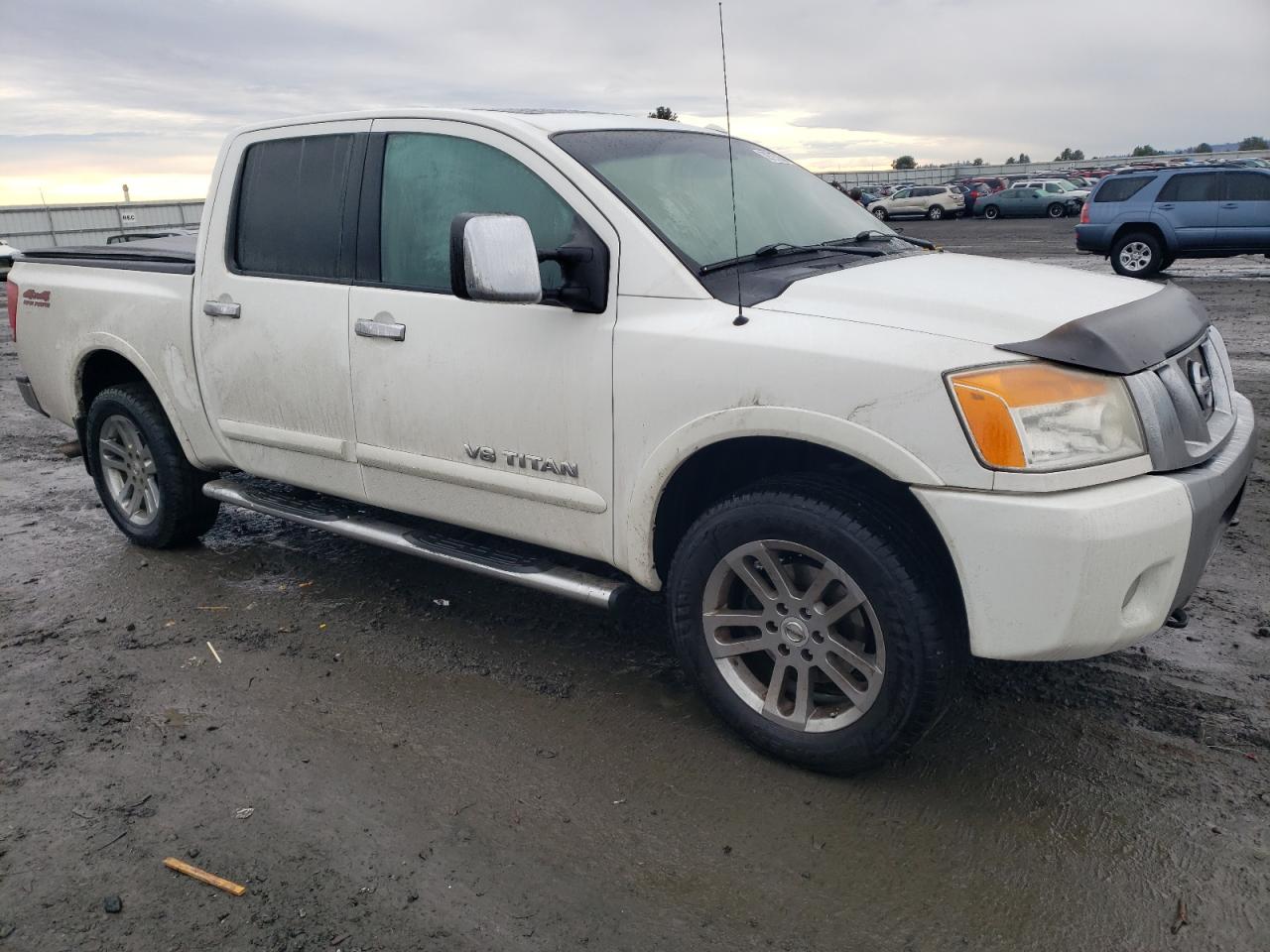 Photo 3 VIN: 1N6AA0EC8CN301267 - NISSAN TITAN 