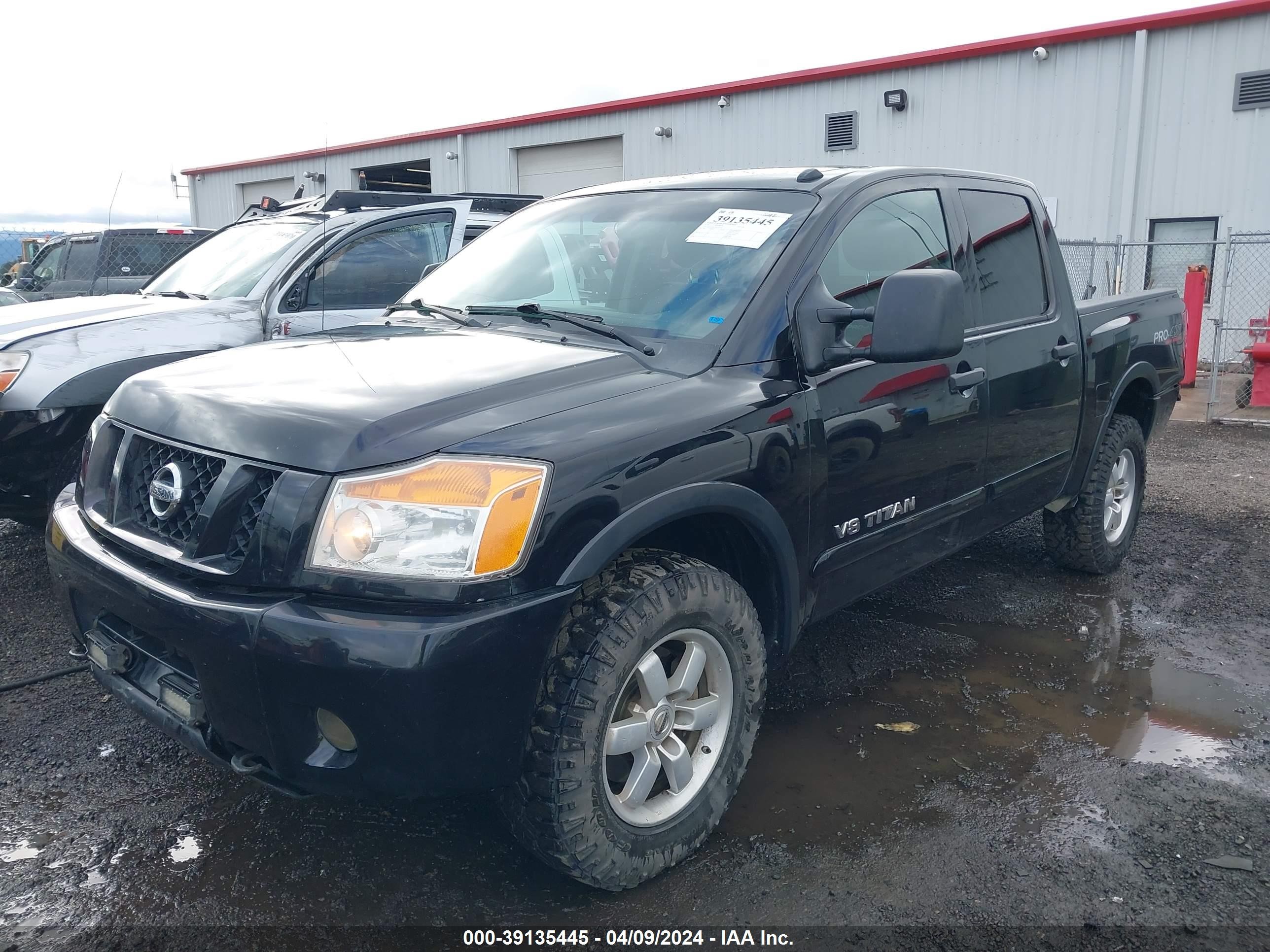 Photo 1 VIN: 1N6AA0EC9AN321251 - NISSAN TITAN 