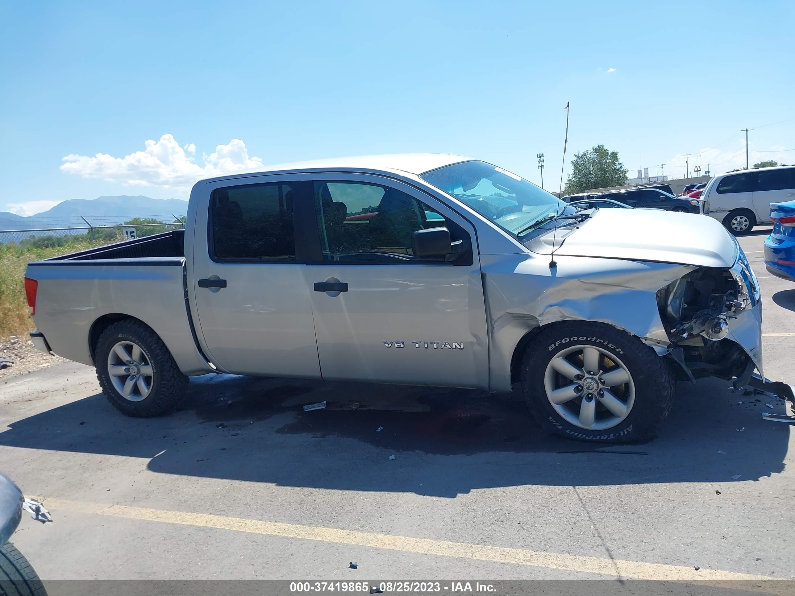 Photo 12 VIN: 1N6AA0EJ7CN311092 - NISSAN TITAN 