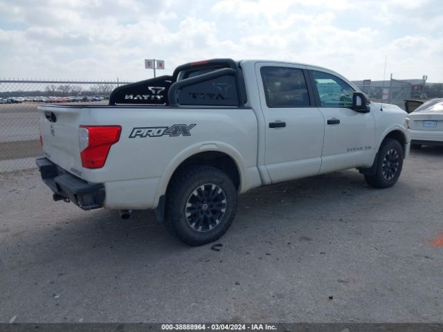 Photo 3 VIN: 1N6AA1E50JN518817 - NISSAN TITAN 