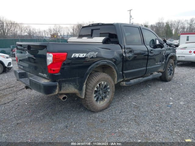 Photo 3 VIN: 1N6AA1E52KN531358 - NISSAN TITAN 