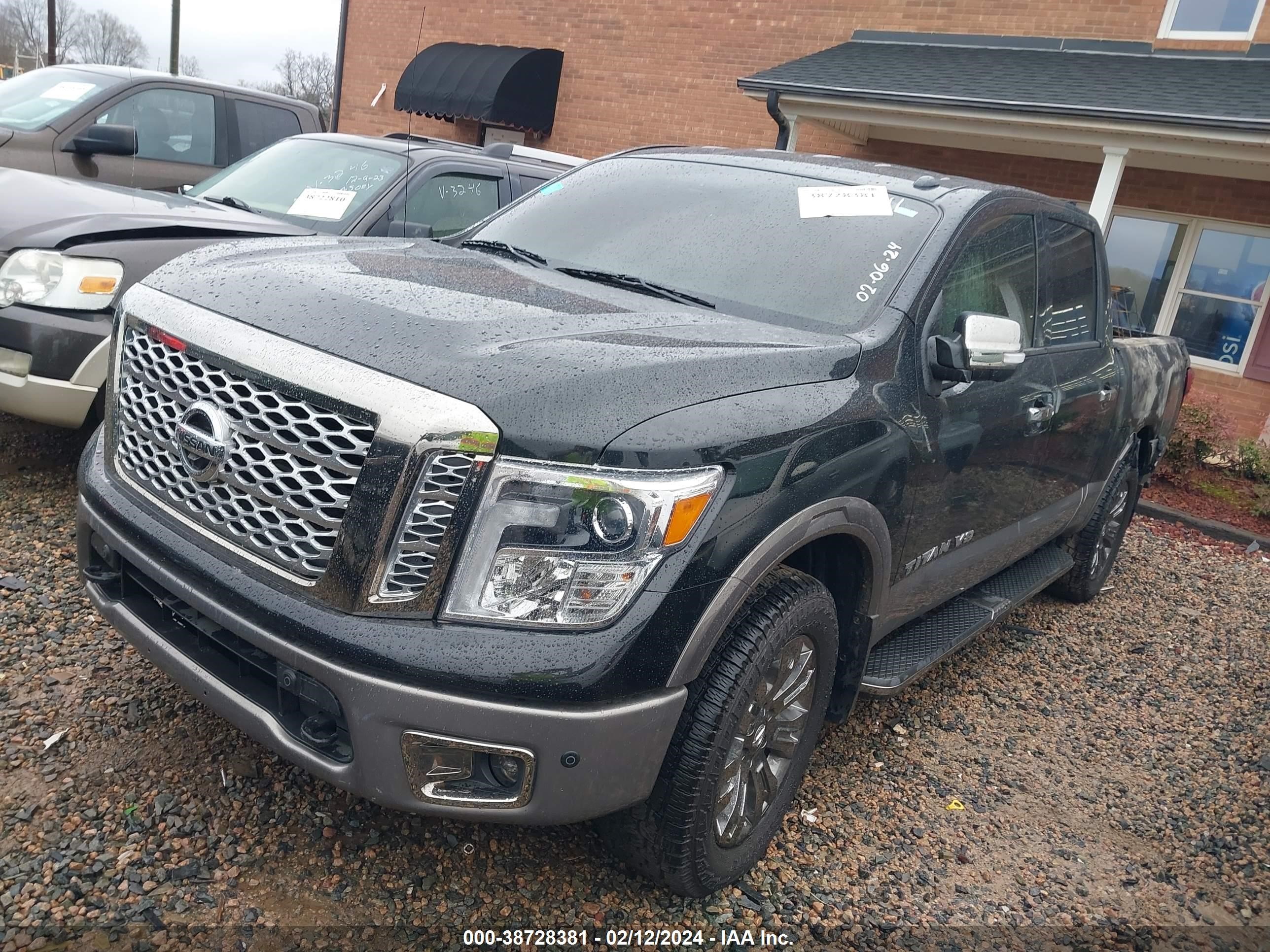 Photo 1 VIN: 1N6AA1E53KN506811 - NISSAN TITAN 