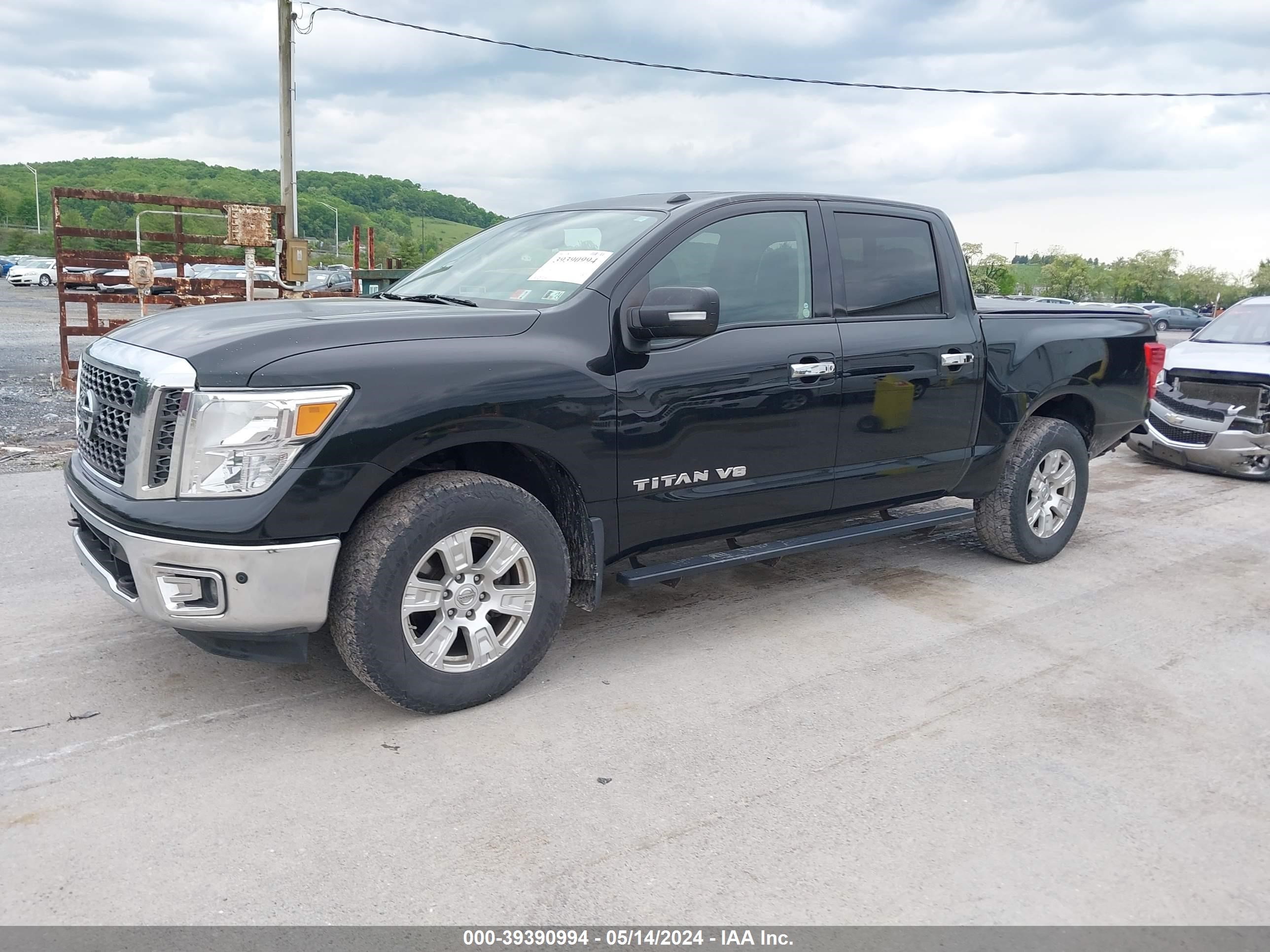 Photo 1 VIN: 1N6AA1E54JN530341 - NISSAN TITAN 