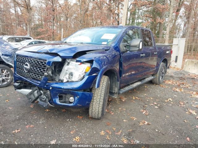 Photo 1 VIN: 1N6AA1E59JN517908 - NISSAN TITAN 