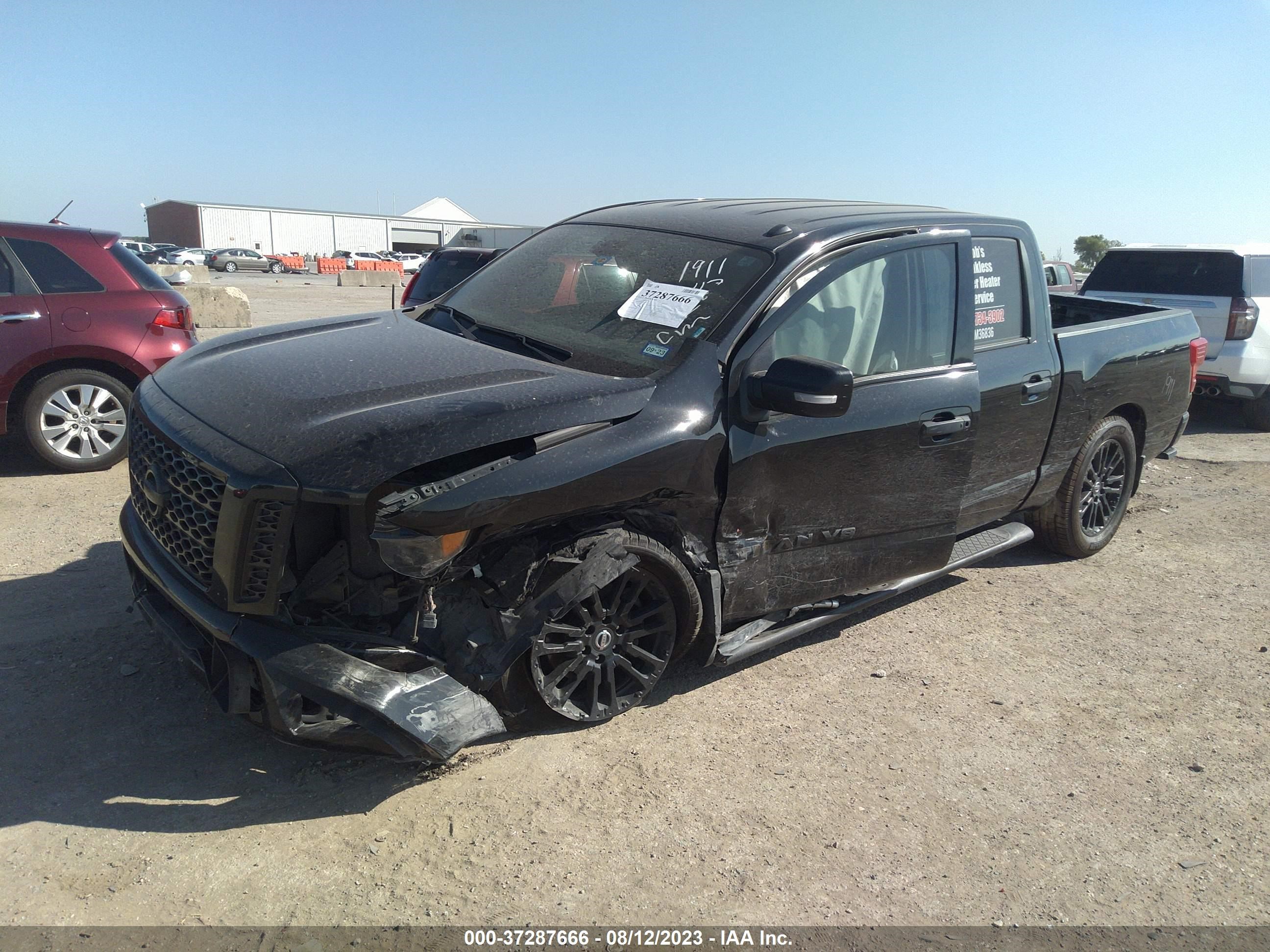 Photo 1 VIN: 1N6AA1E65KN529712 - NISSAN TITAN 