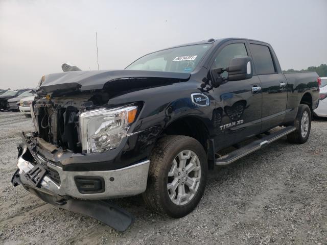 Photo 1 VIN: 1N6AA1F4XKN531243 - NISSAN TITAN XD 