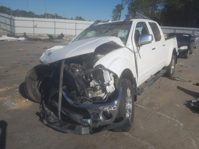 Photo 1 VIN: 1N6AD0FVXBC424859 - NISSAN FRONTIER 