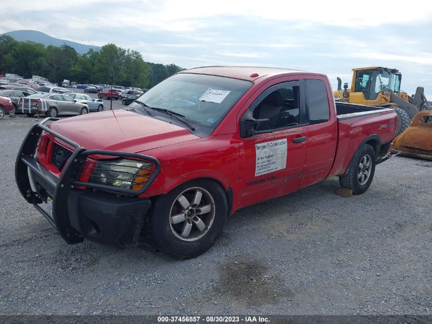 Photo 1 VIN: 1N6BA0CC2CN312854 - NISSAN TITAN 