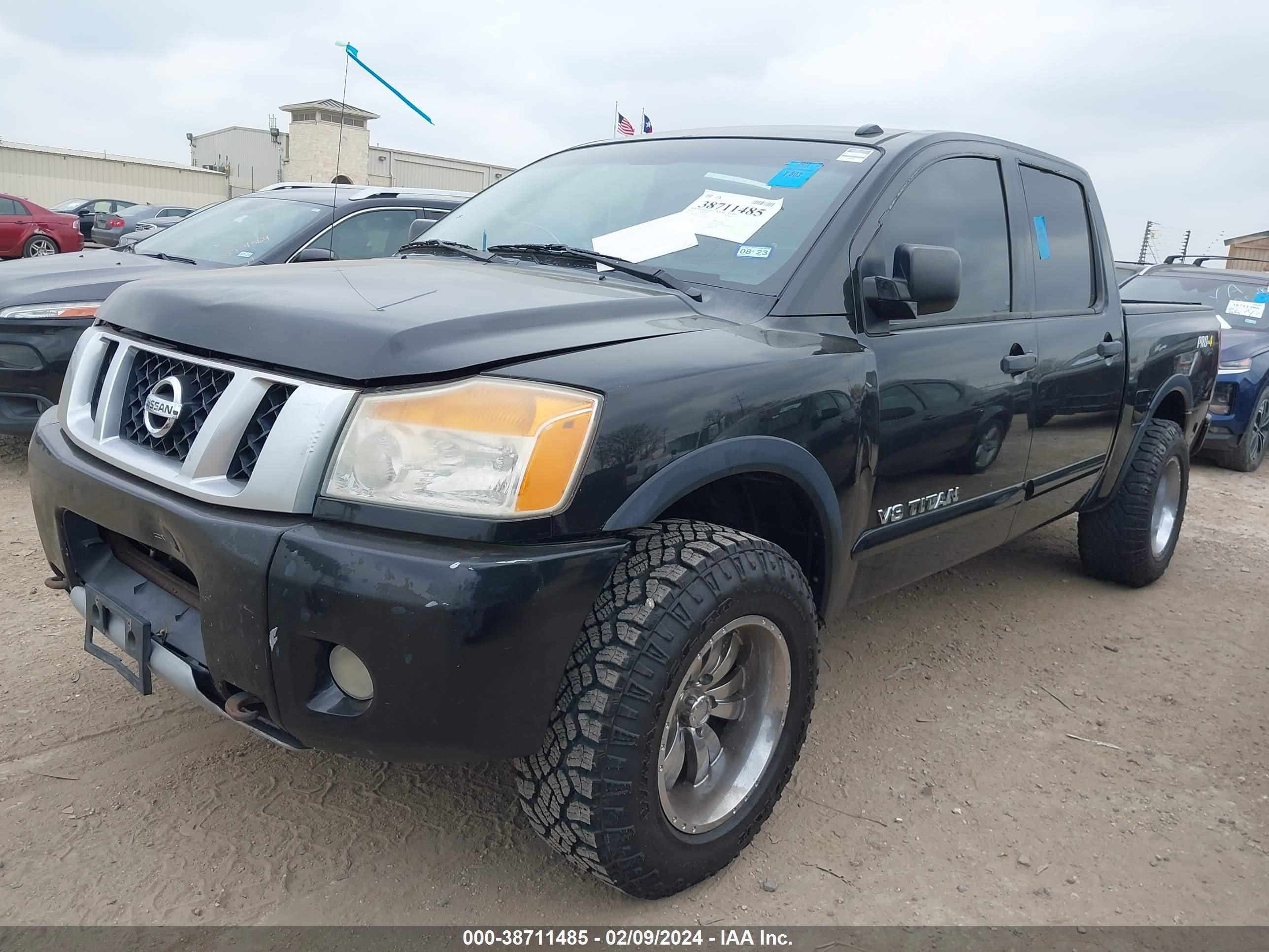 Photo 1 VIN: 1N6BA0EC3EN503103 - NISSAN TITAN 