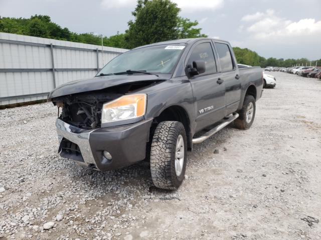 Photo 1 VIN: 1N6BA0EC5AN305763 - NISSAN TITAN XE 